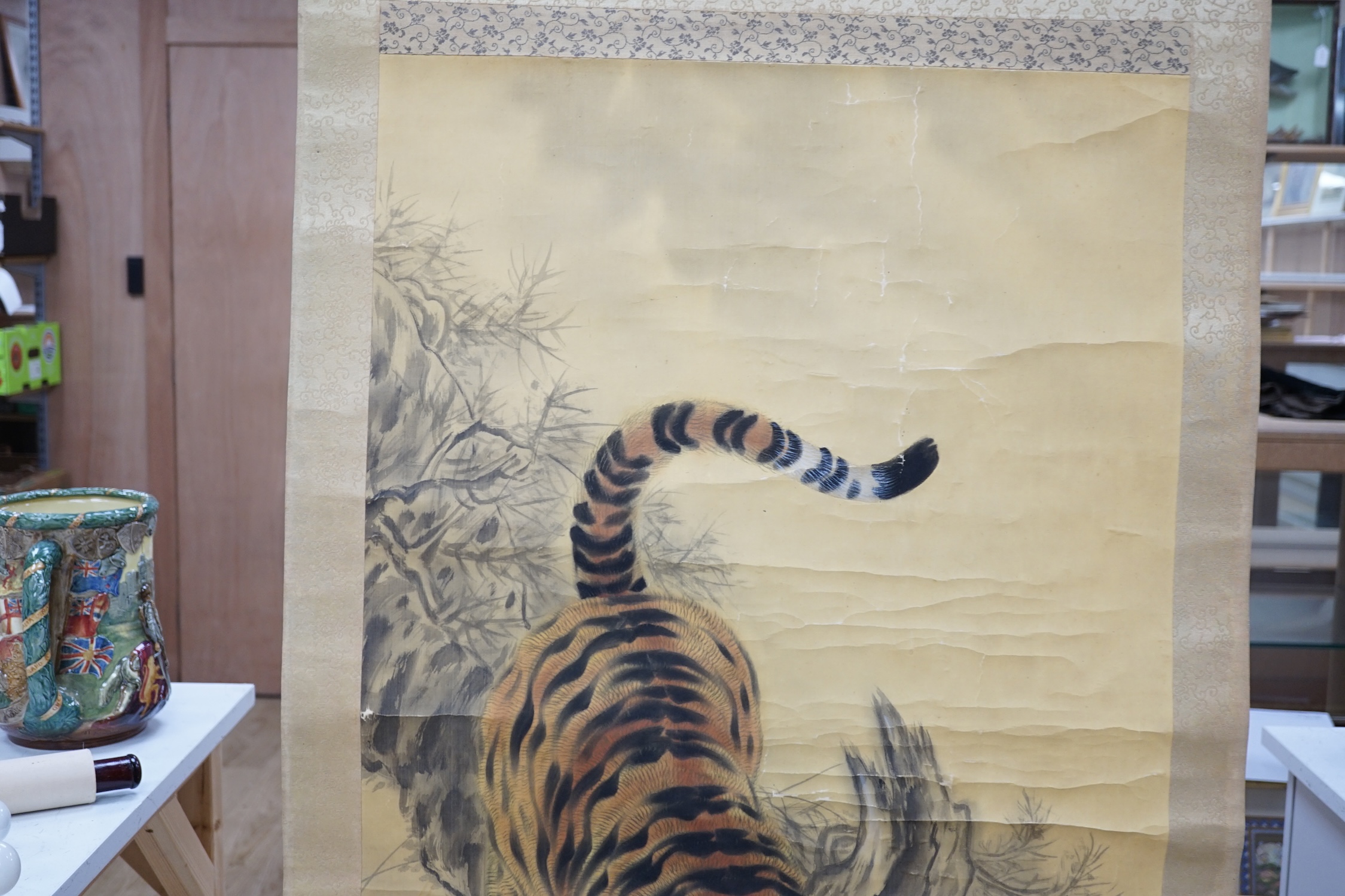 A Japanese ‘tiger’ scroll painting. Condition - fair